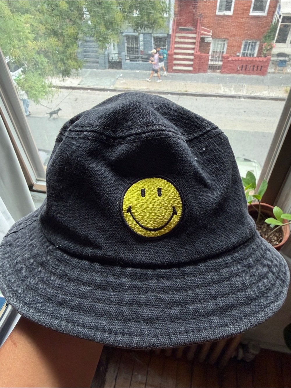 Kids Black Bucket Hat with Yellow Smiley Patch